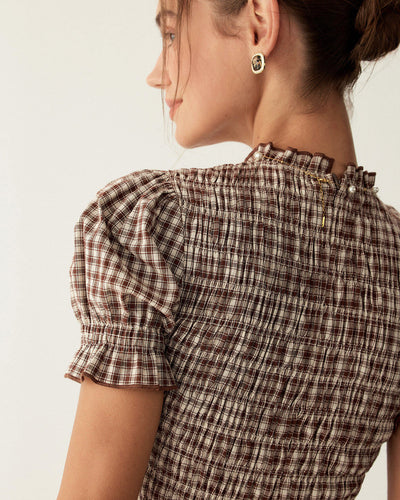 Mini-robe à carreaux café à manches bouffantes